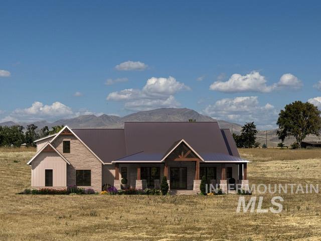 Craftsman inspired home with a mountain view, covered porch, stone siding, and a view of rural / pastoral area