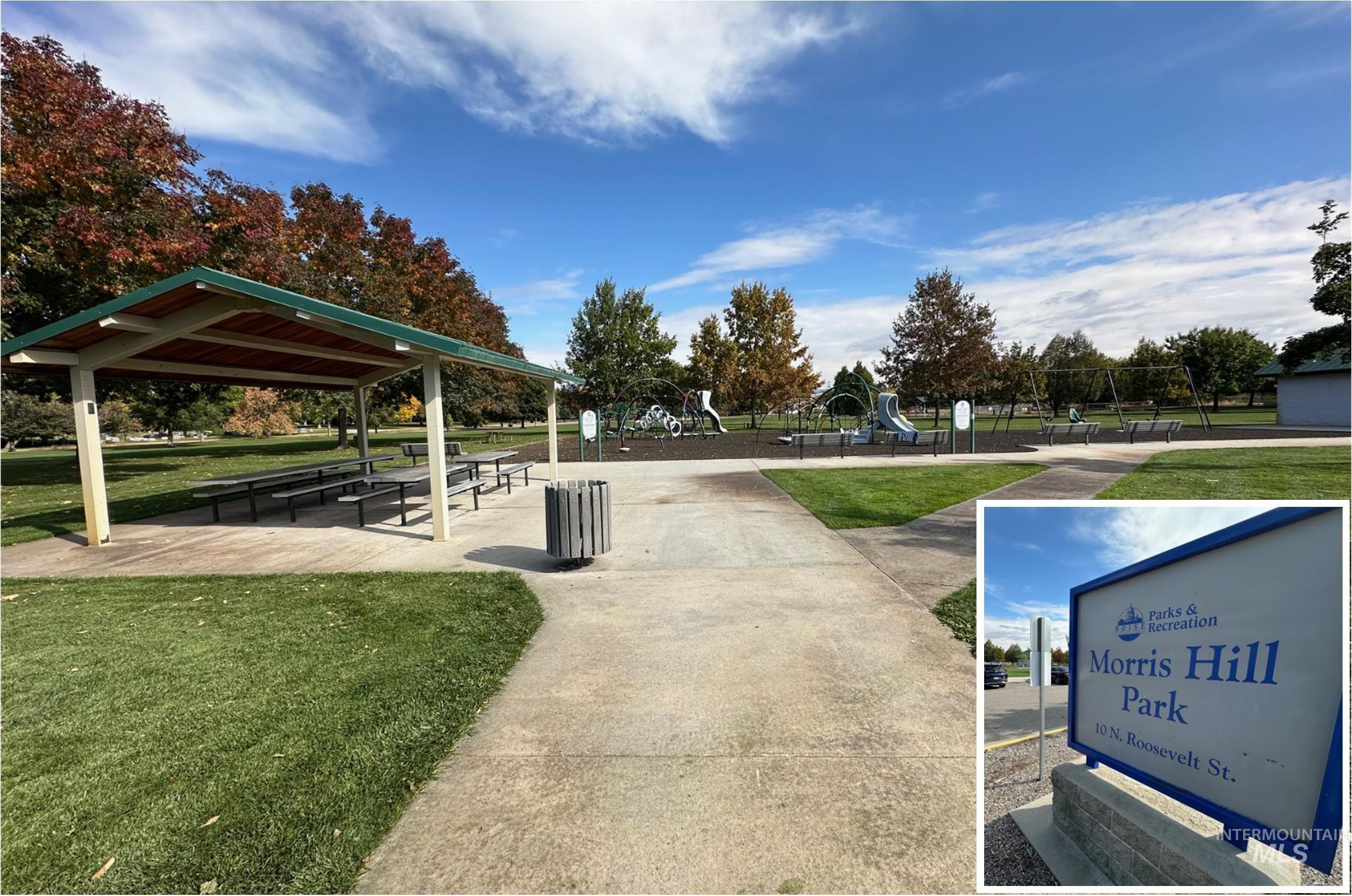 View of property's community with a lawn and a patio area