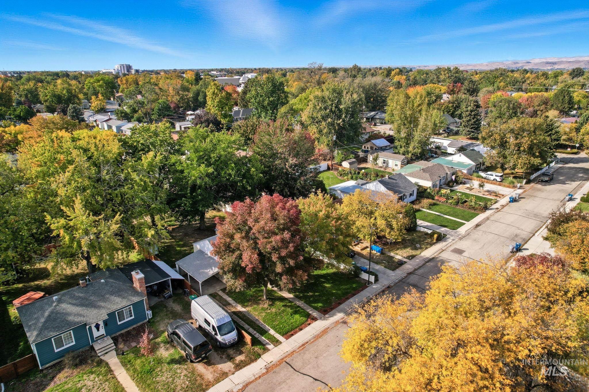 Aerial overview of property's location with nearby suburban area