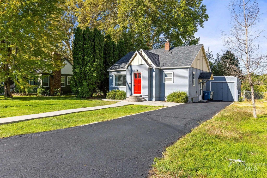 Photo of 619 Powerline Road, Nampa, ID 83686 (MLS # 99000174)
