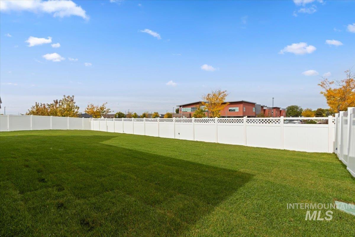 View of fenced backyard