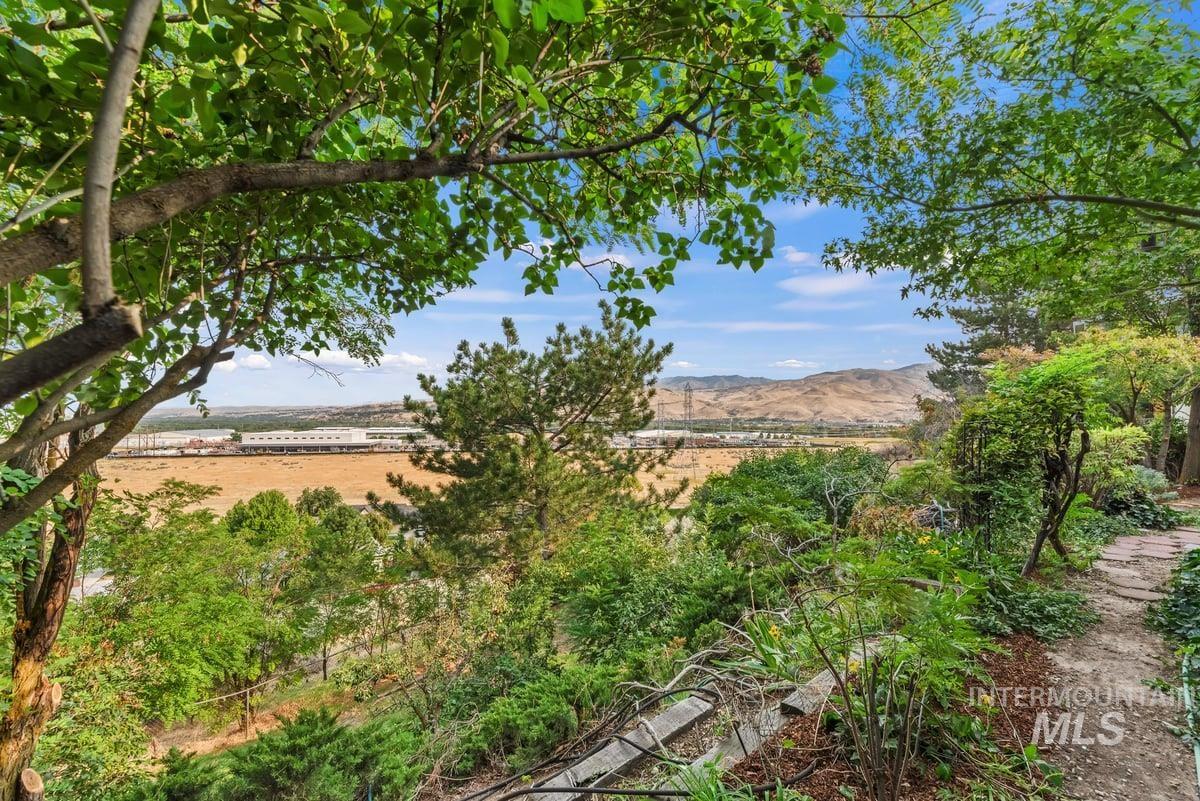 View of yard with a mountain view