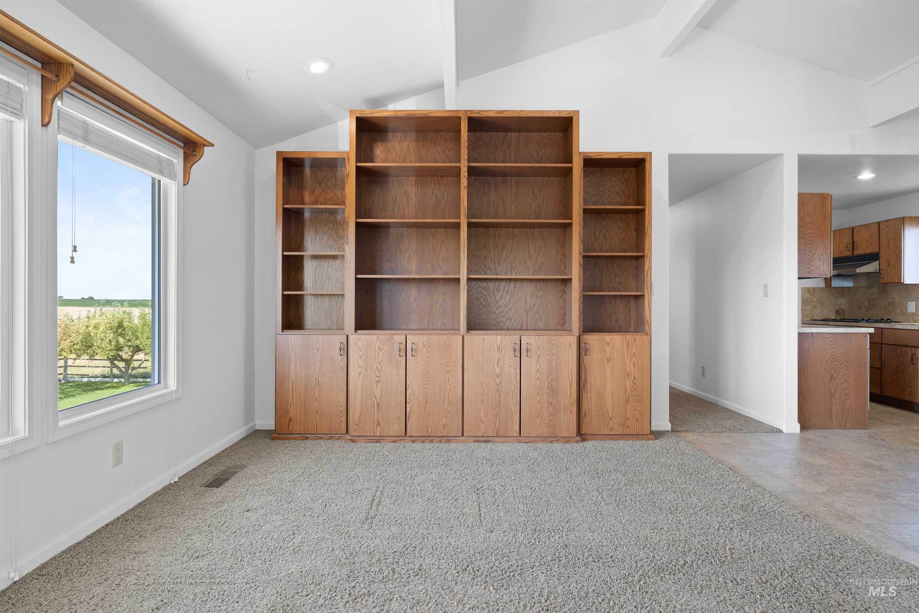 Spare room with recessed lighting and light colored carpet