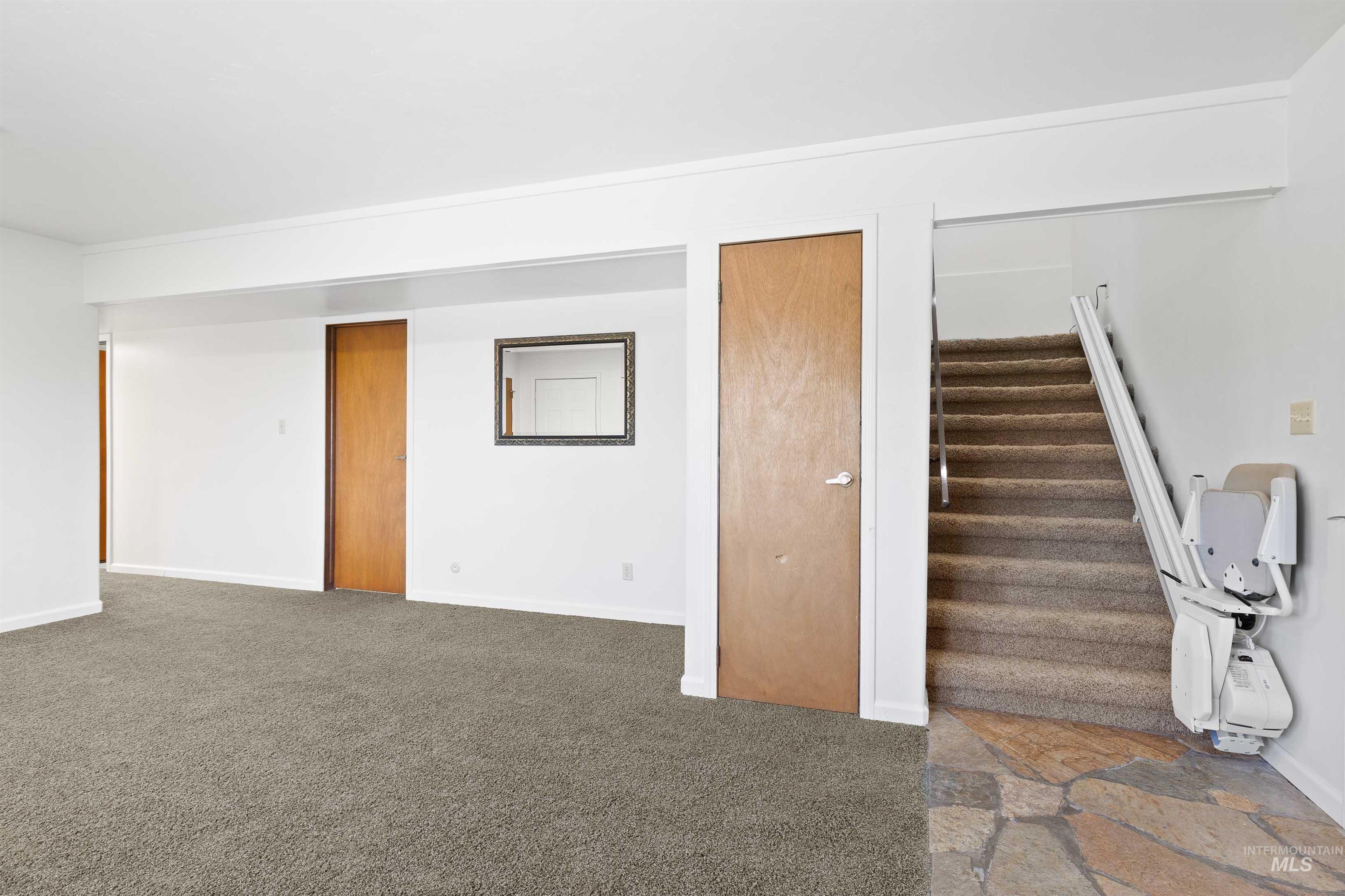 Staircase with carpet floors