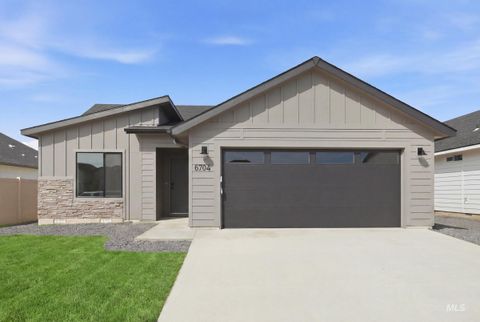 Photo of 6704 W Plateau Creek Dr, Meridian, ID 83646 (MLS # 98978561)