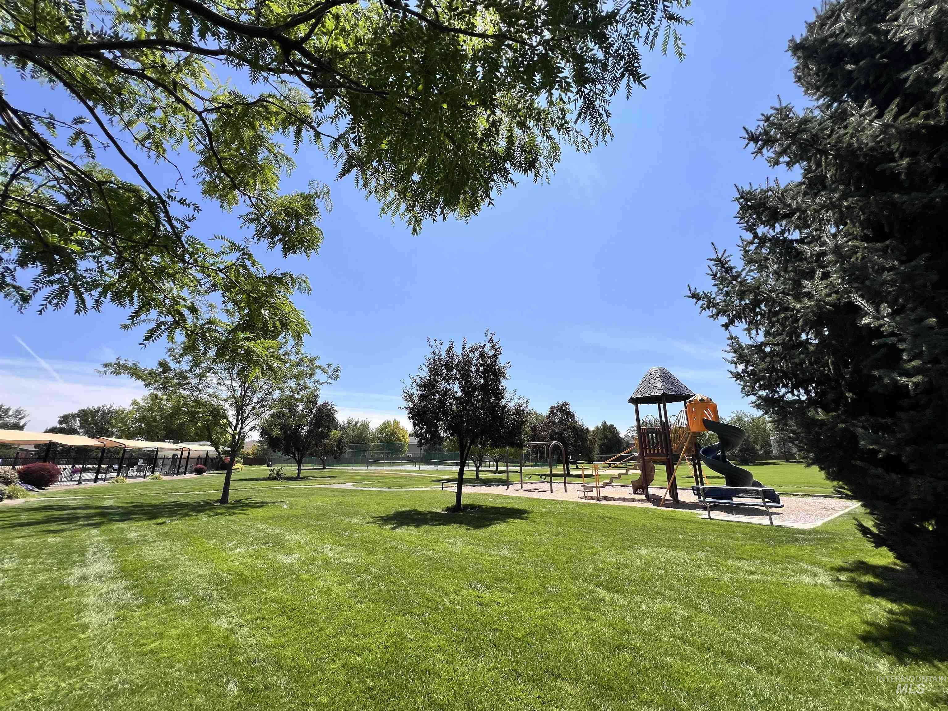 View of home's community featuring a lawn