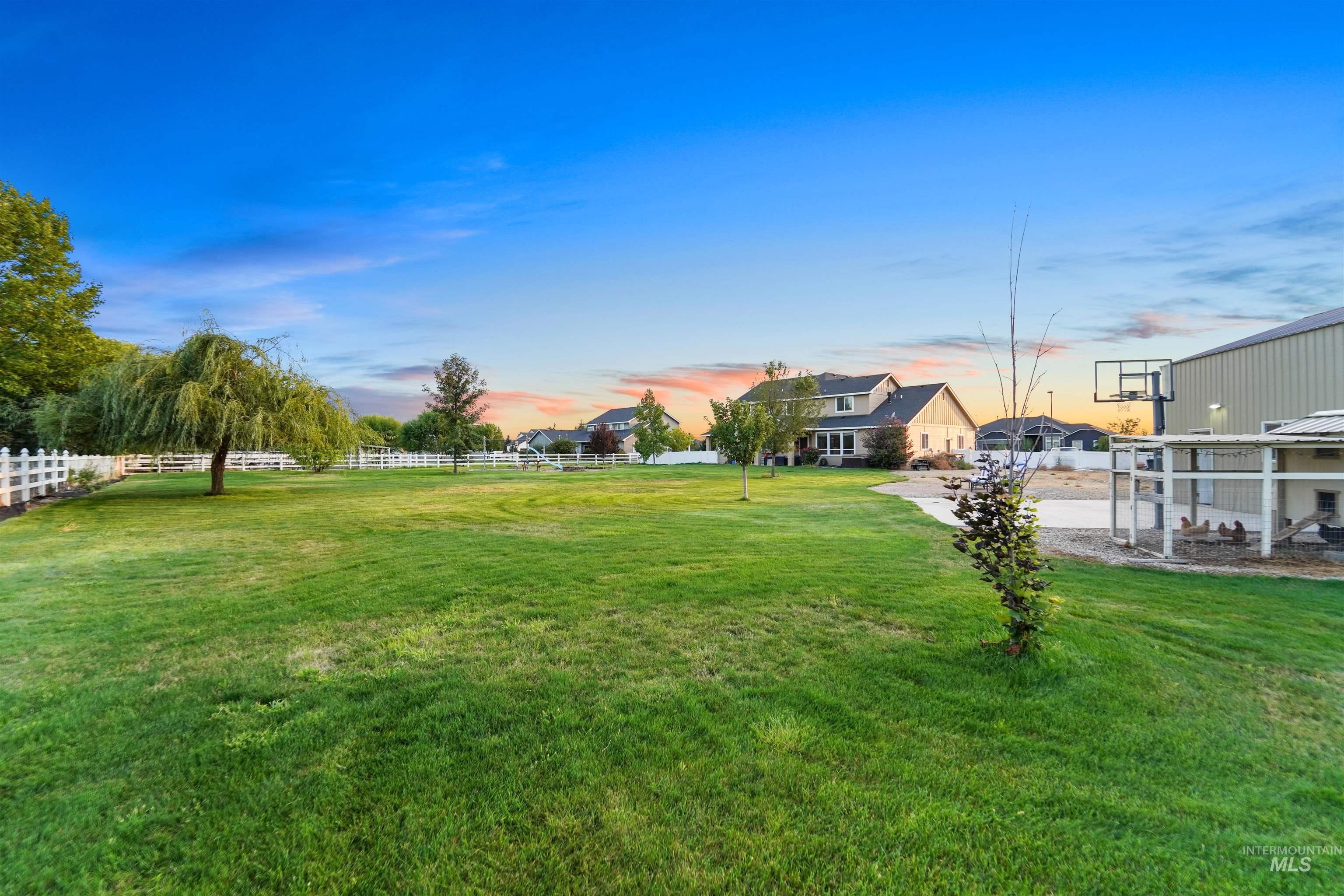 Yard at dusk with a patio