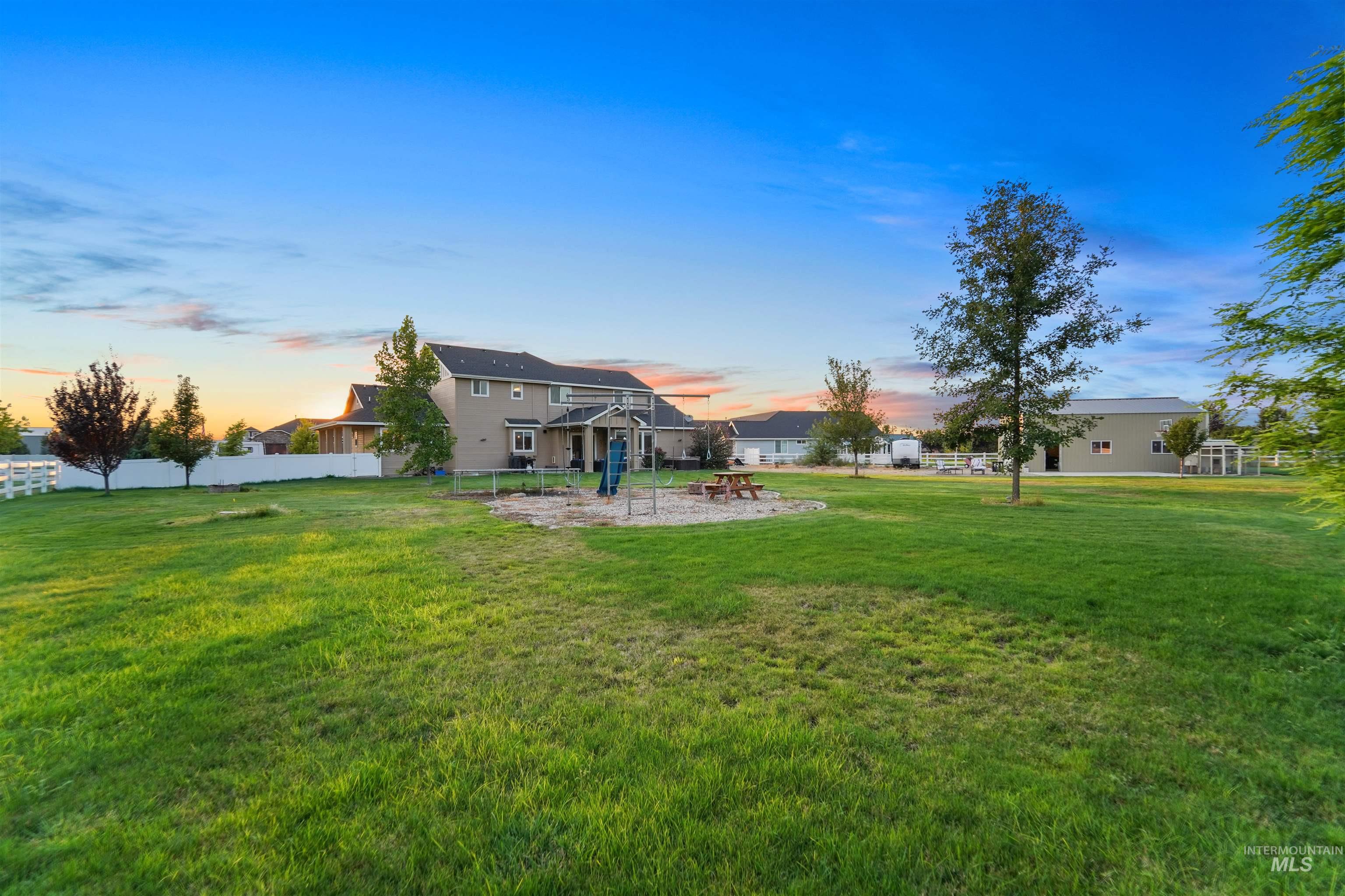 Back of house with a patio area