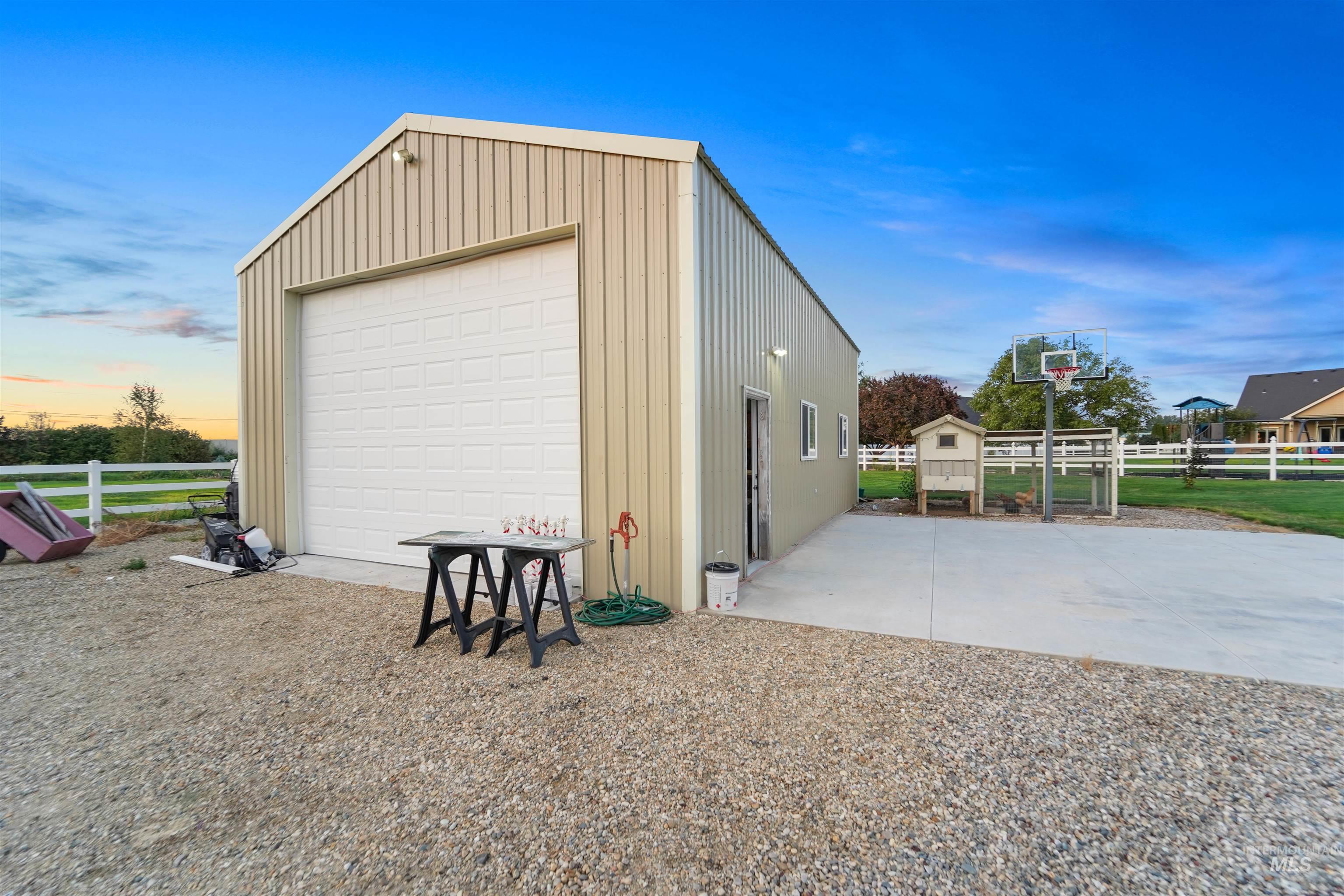Garage at dusk with a garage