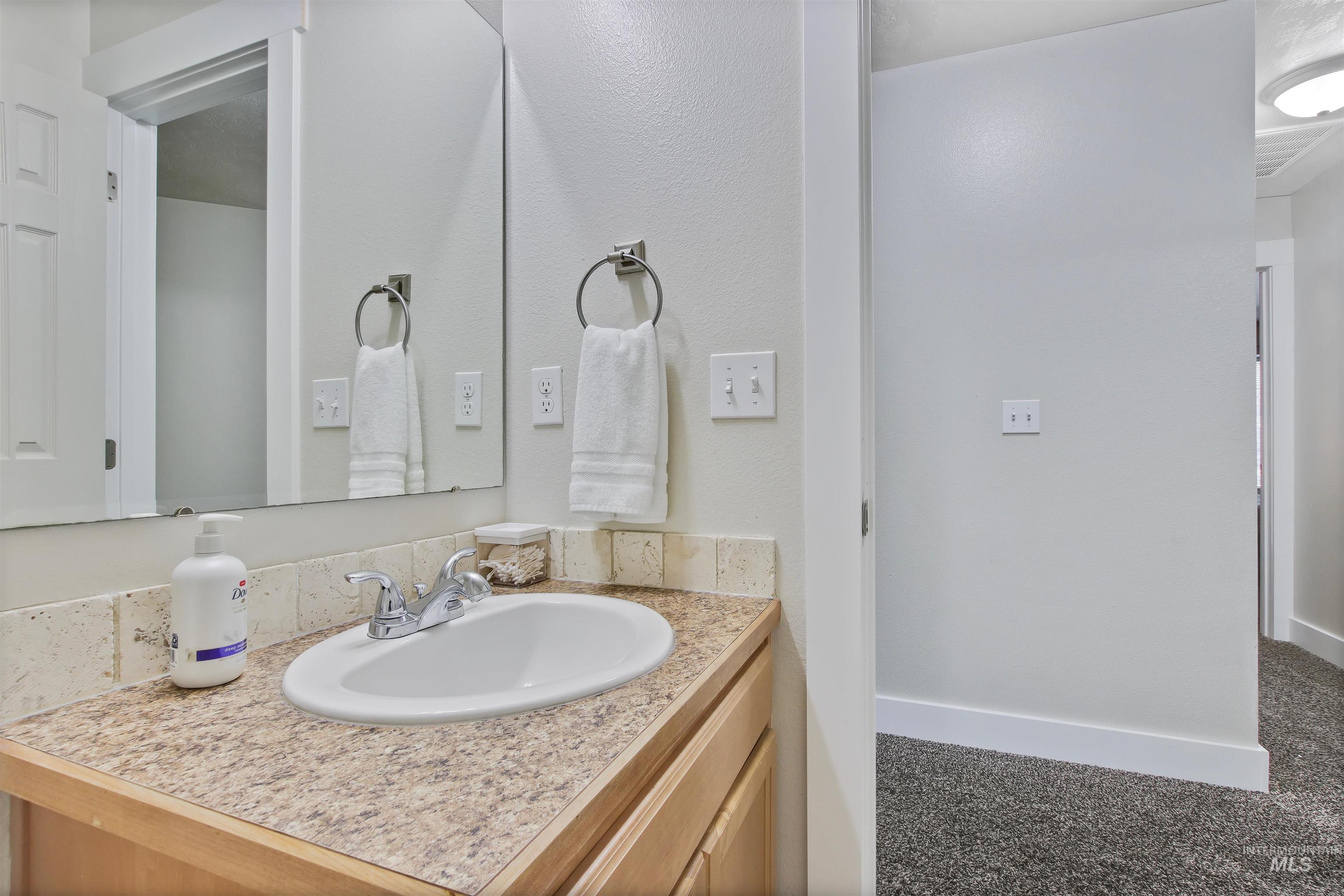 Bathroom featuring vanity