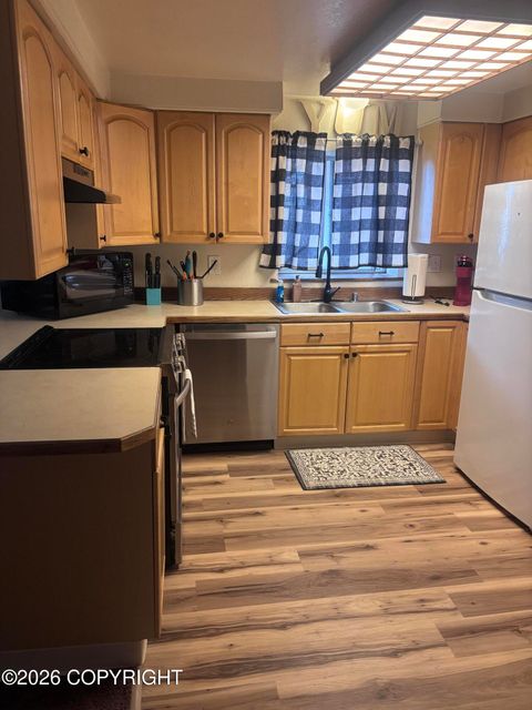 Photo of 524 Eyak Drive #7, Anchorage, AK 99501 (MLS # 26-8476)