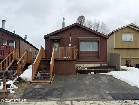 Photo of 561 Izembek Circle, Anchorage, AK 99508 (MLS # 26-4556)