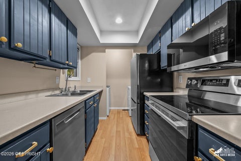 Photo of 7340 Huntsmen Circle #G, Anchorage, AK 99518 (MLS # 26-9943)