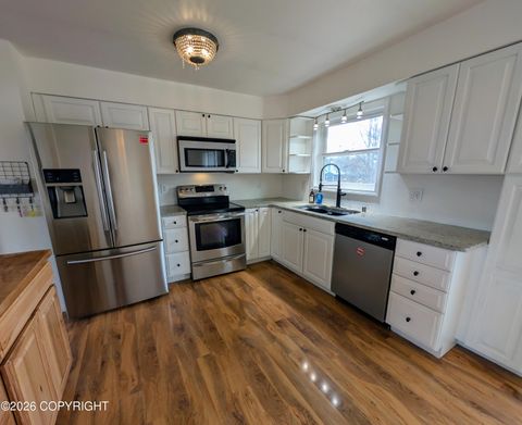 Photo of 4536 E 6th Avenue, Anchorage, AK 99508 (MLS # 26-4801)