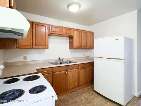 Photo of 1025 E 10th Avenue #11, Anchorage, AK 99501 (MLS # 26-10650)