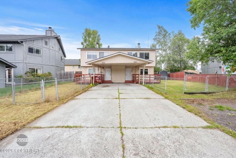 Photo of 8931 Woodstock Circle, Anchorage, AK 99502 (MLS # 26-9867)