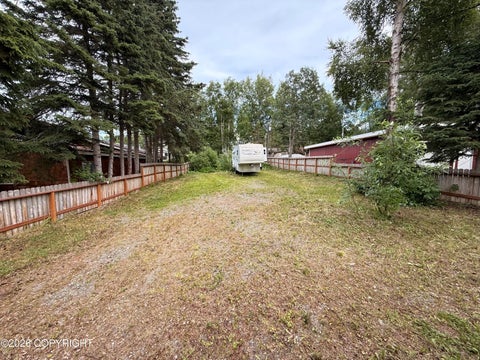 Photo of 8039 Wilcox Street, Anchorage, AK 99502 (MLS # 26-8313)