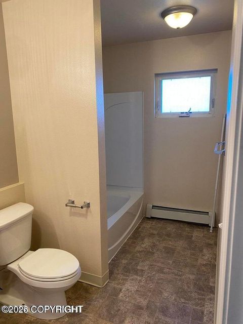 Photo of 1331 W 26th Avenue #7, Anchorage, AK 99503 (MLS # 26-3848)