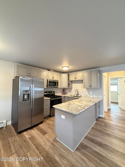 Photo of 204 Rondy Court #8, Anchorage, AK 99501 (MLS # 26-2169)