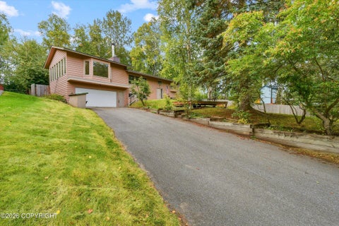 Photo of 3740 Winterset Drive, Anchorage, AK 99508 (MLS # 26-11795)