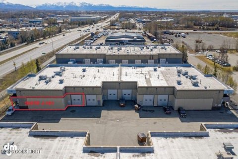 Photo of 5701 Silverado Way #J-101, Anchorage, AK 99518 (MLS # 26-6863)