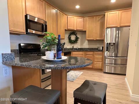 Photo of 6934 Meadow Street #404, Anchorage, AK 99507 (MLS # 26-10715)