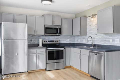 Photo of 7068 Weimer Road #5, Anchorage, AK 99502 (MLS # 26-7567)