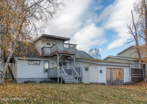 Photo of 1430 Columbine Street, Anchorage, AK 99508 (MLS # 26-12930)
