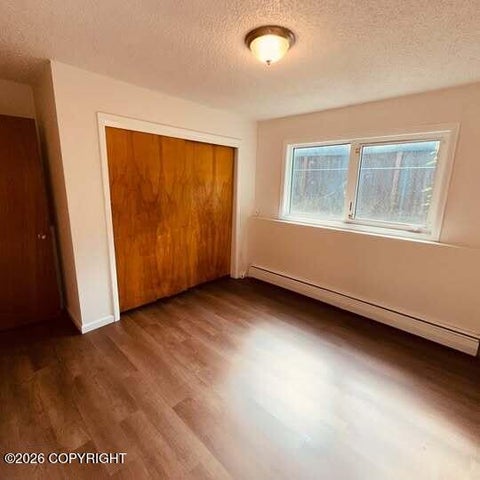 Photo of 3932 E 9th Avenue #4, Anchorage, AK 99501 (MLS # 26-7499)