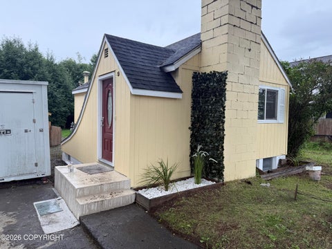 Photo of 1443 W 25th Avenue, Anchorage, AK 99503 (MLS # 26-9815)