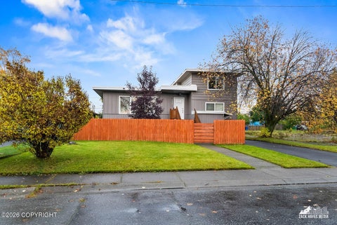 Photo of 1409 Juneau Street, Anchorage, AK 99501 (MLS # 26-12880)