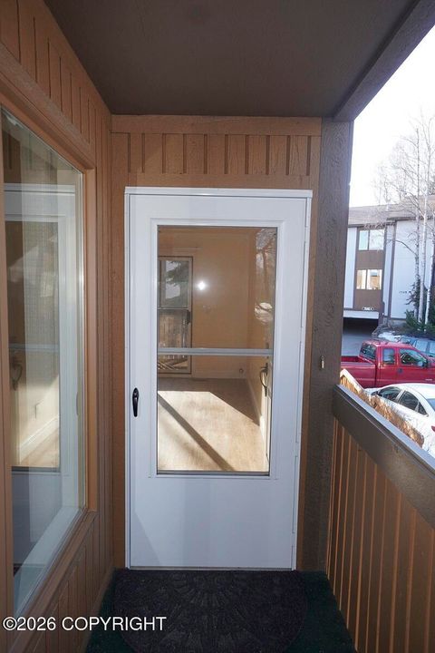 Photo of 7518 Foxridge Way #1F, Anchorage, AK 99518 (MLS # 26-3635)