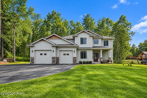 Photo of 21930 Sheltering Spurce Loop, Chugiak, AK 99567 (MLS # 26-12758)
