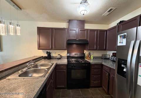 Photo of 8050 Pioneer Drive #303, Anchorage, AK 99504 (MLS # 26-8582)