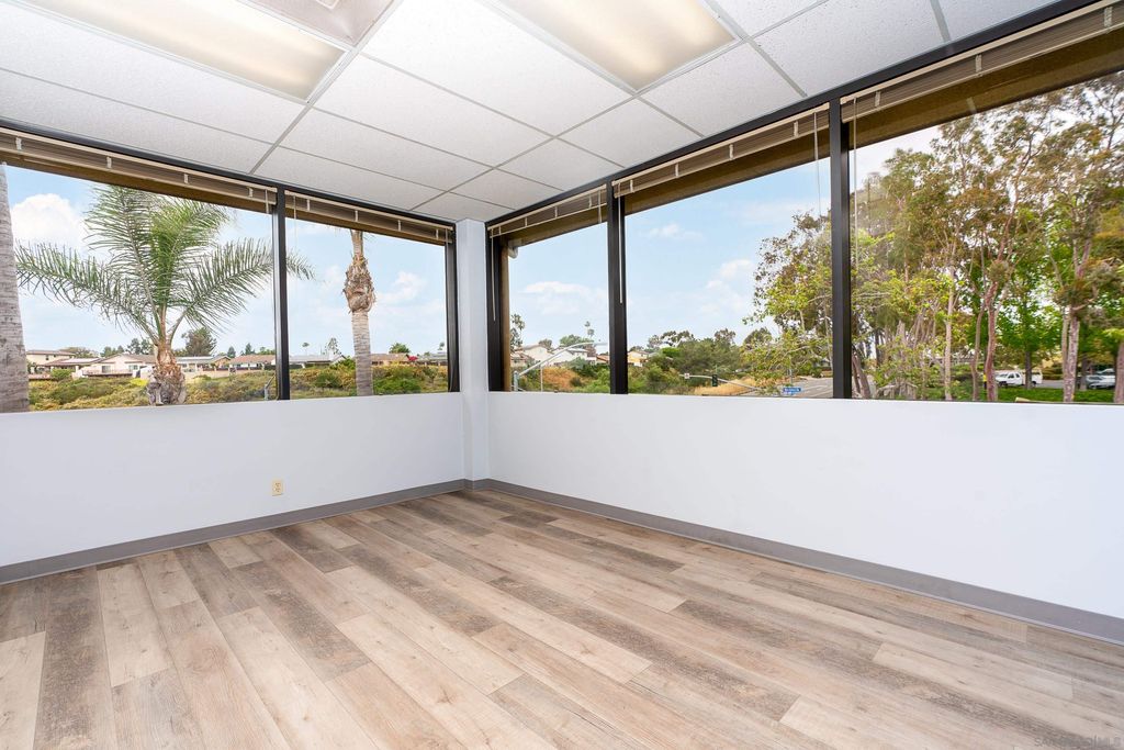 Photo of 6390 Greenwich Drive, San Diego, CA 92122 (MLS # 230021904)
