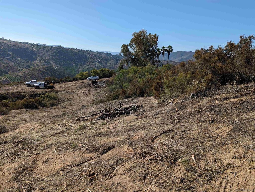 Photo of 13723 Pauma Vista Dr, Valley Center, CA 92082 (MLS # 240001858)