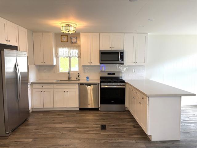 8975 LAWRENCE WELK DR.