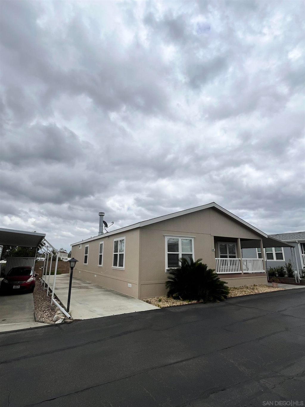 Photo of 1219 E Barham Dr #SPC 81, San Marcos, CA 92078 (MLS # 250024525)