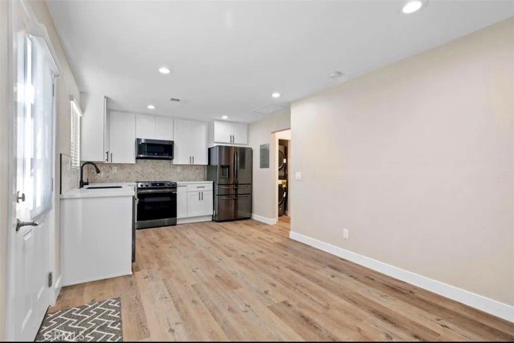 Photo of 8130 E Topia #A, Long Beach, CA 90808 (MLS # OC26077837)