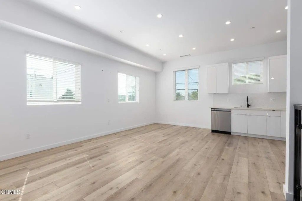 Photo of 4179 Normandie Avenue #1/2, Los Angeles, CA 90037 (MLS # P1-25670)