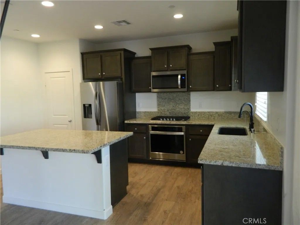 Photo of 24231 Buckeye Ave, Murrieta, CA 92562 (MLS # IG26069211)