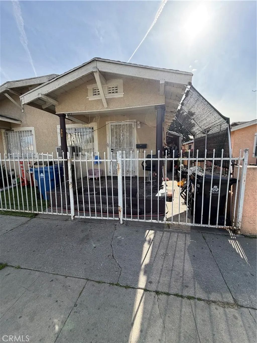 Photo of 352 E 84th Pl, Los Angeles, CA 90003 (MLS # DW26034692)