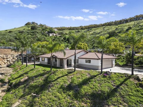 Photo of 13966 Avenida Del Charro, El Cajon, CA 92021 (MLS # 260006210)