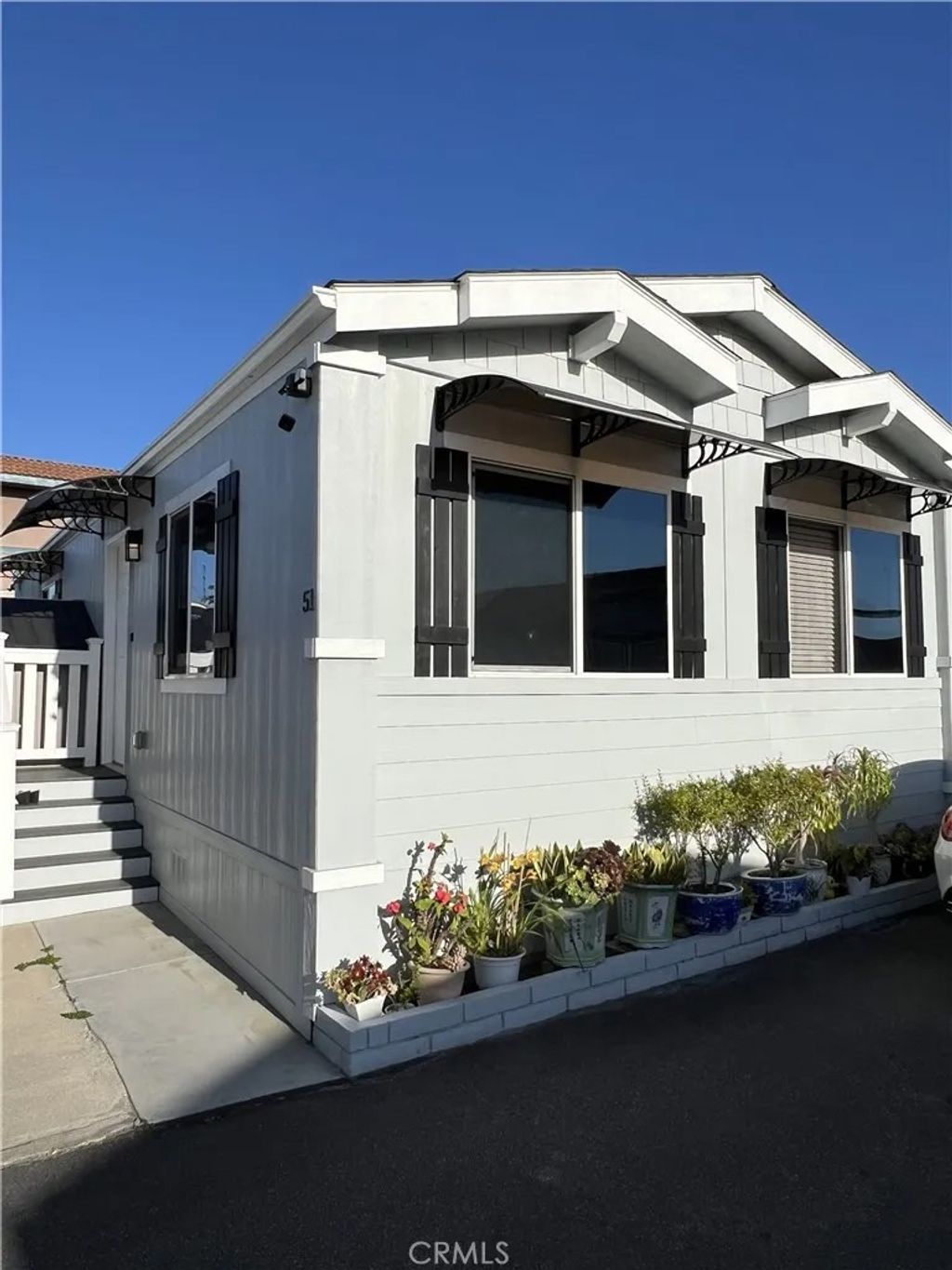 Photo of 15141 beach Blvd #51, Midway City, CA 92655 (MLS # OC26084045)