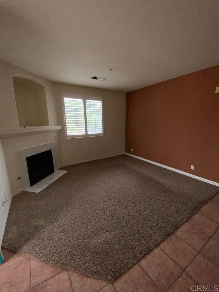 Photo of 11422 Via Rancho San Diego #402, El Cajon, CA 92019 (MLS # PTP2607667)