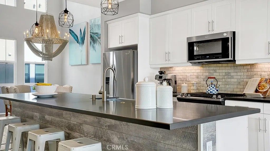 Photo of 1650 Topanga Avenue, Costa Mesa, CA 92627 (MLS # NP26019724)