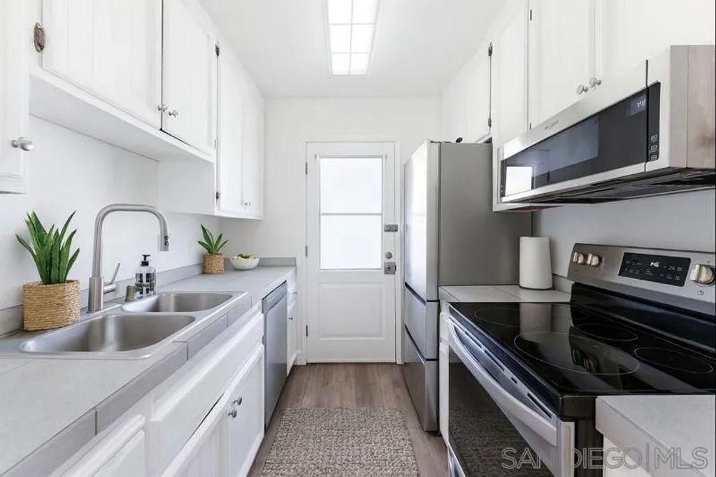 Photo of 12134 Lemon Crest Dr #4, Lakeside, CA 92040 (MLS # 250045511)