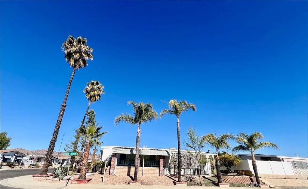 Photo of 30615 Arenga Palm Dr, Homeland, CA 92548 (MLS # SW26054106)