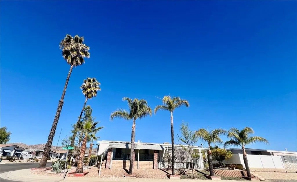 Photo of 30615 Arenga Palm Dr, Homeland, CA 92548 (MLS # SW26054106)