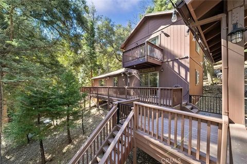 Photo of 330 Canyon Drive, Cedarpines Park, CA 92322 (MLS # IV26054538)